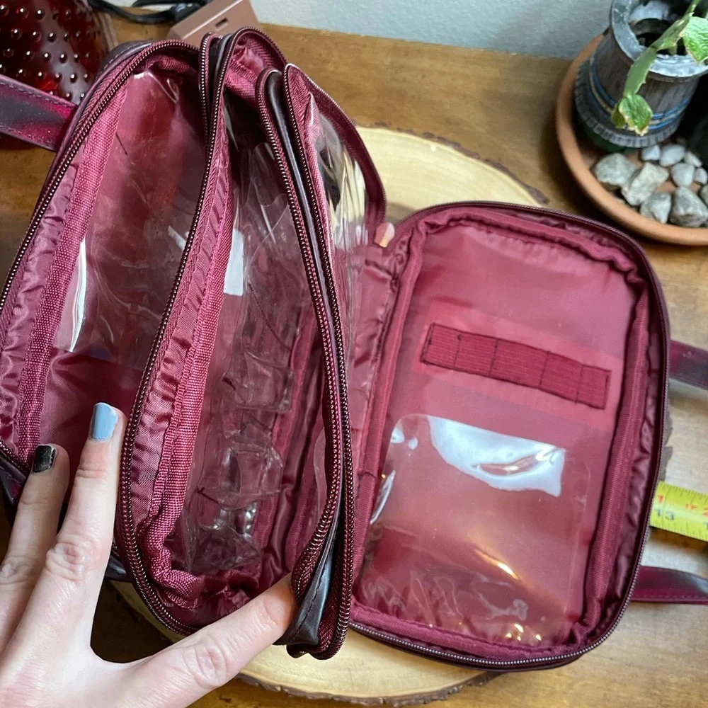 Deep burgundy iridescent handbag make up bag roomy storage opens wide zipper